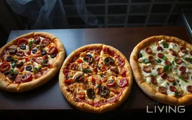Triple the Joy: 3 Large Pizzas - 79 QAR